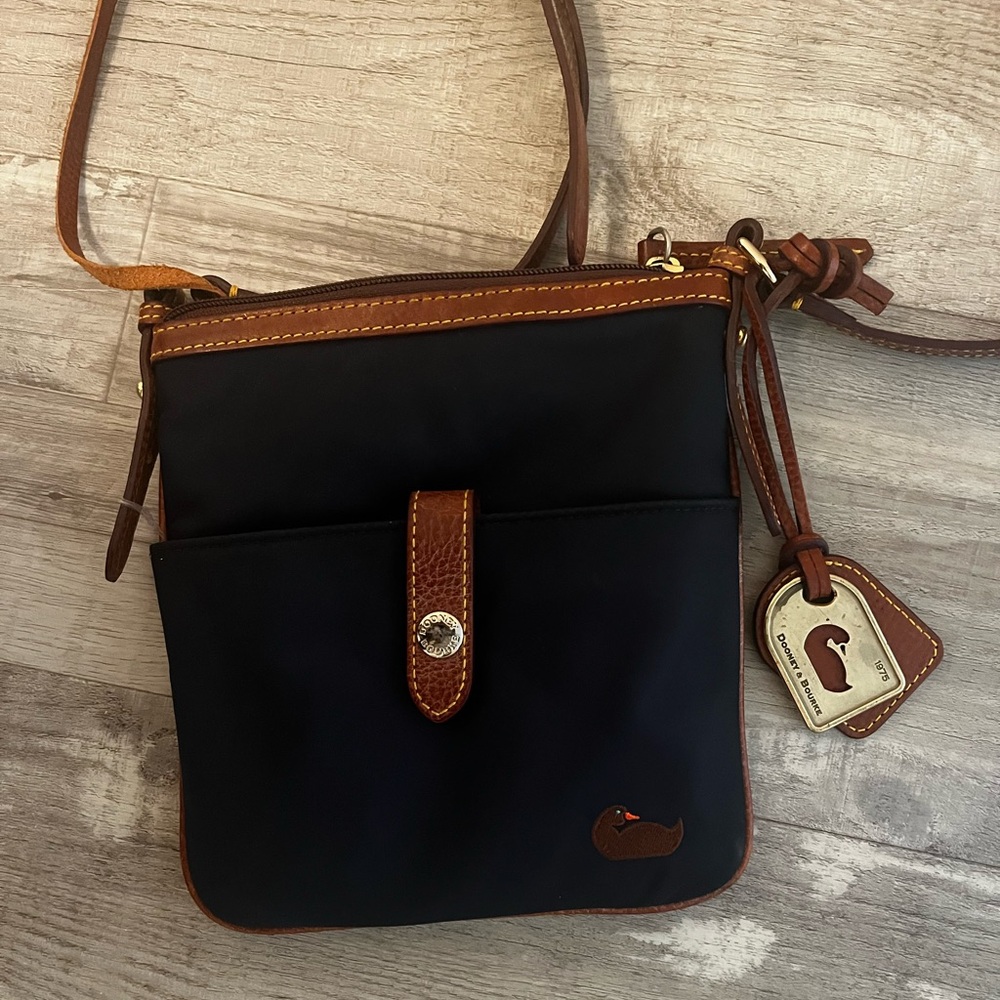 Authentic Classic Navy and Brown Crossbody Bag by Dooney and Bourke.